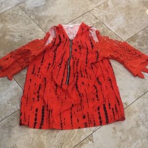 Vibrant Red Top with black accents